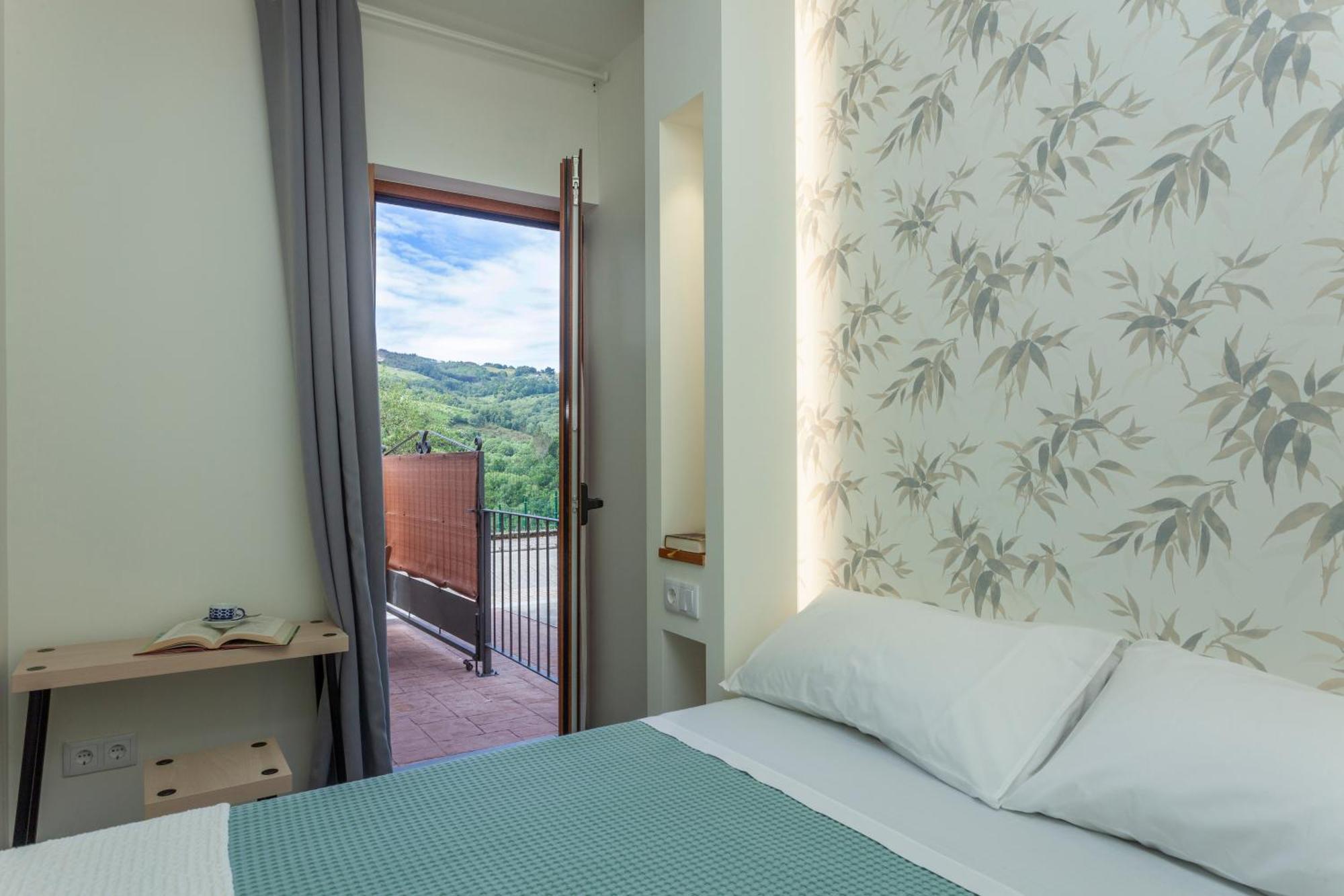 Apartamentos Rurales Tin Turismo 圣埃乌拉利亚德奥斯科斯 外观 照片