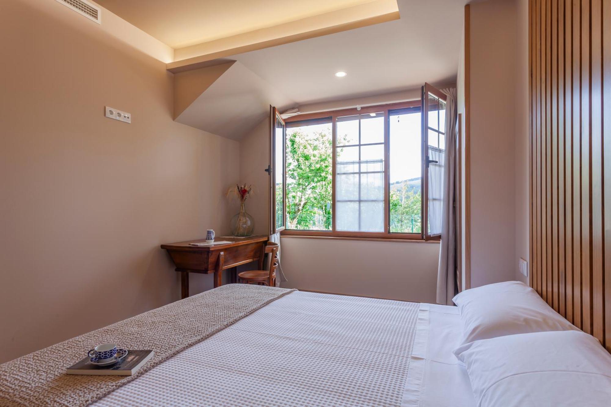 Apartamentos Rurales Tin Turismo 圣埃乌拉利亚德奥斯科斯 外观 照片