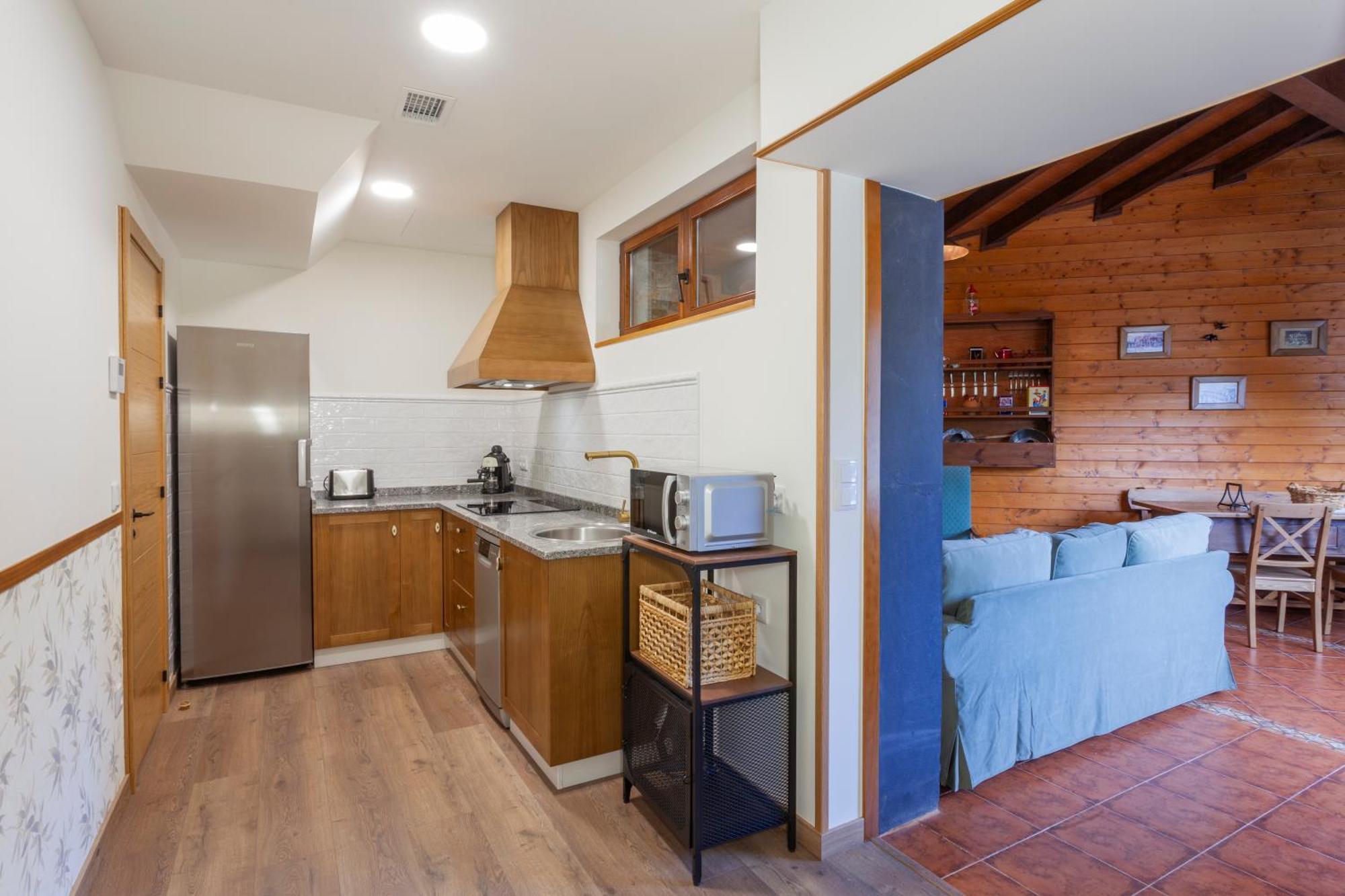 Apartamentos Rurales Tin Turismo 圣埃乌拉利亚德奥斯科斯 外观 照片