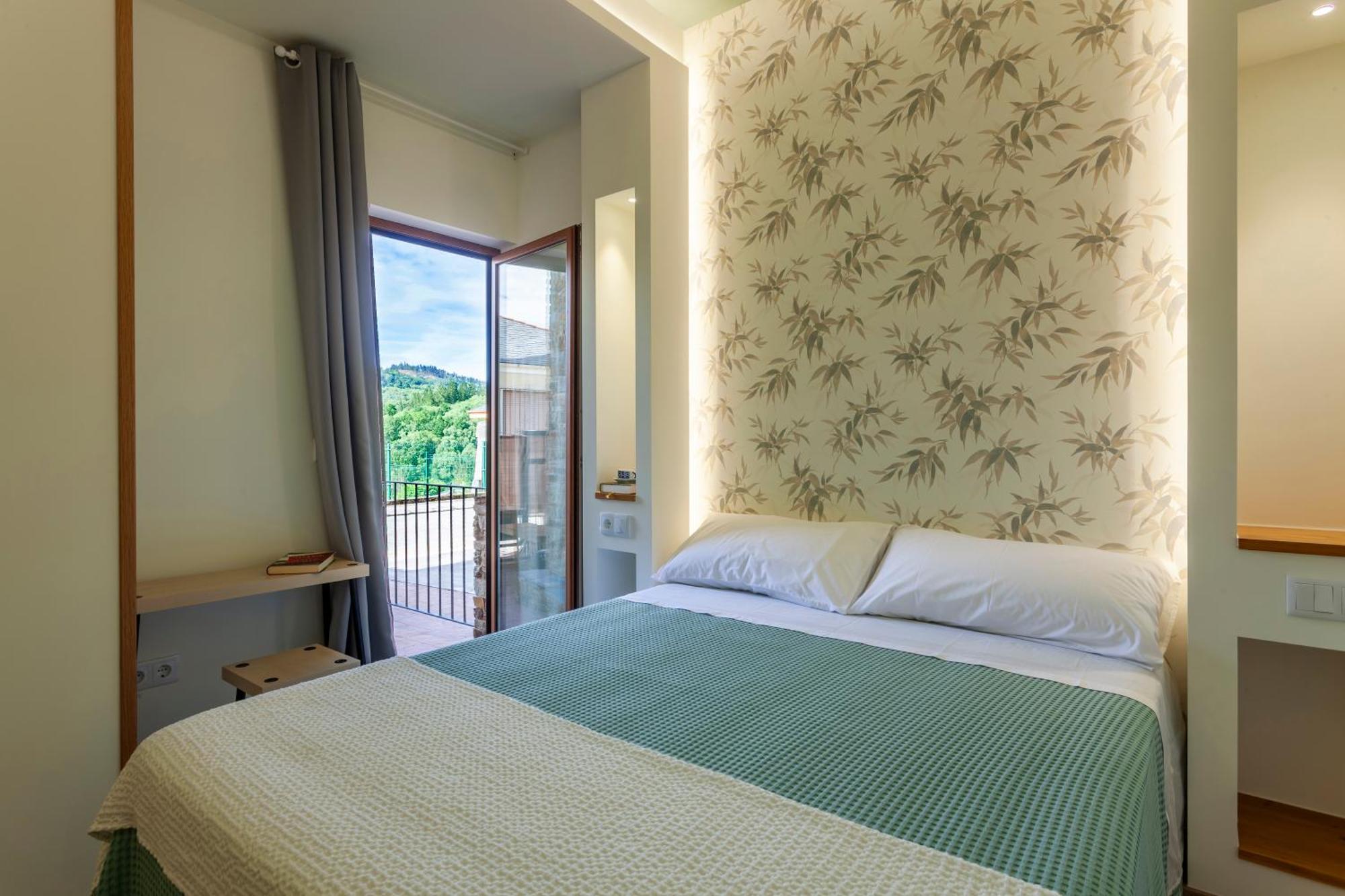 Apartamentos Rurales Tin Turismo 圣埃乌拉利亚德奥斯科斯 外观 照片